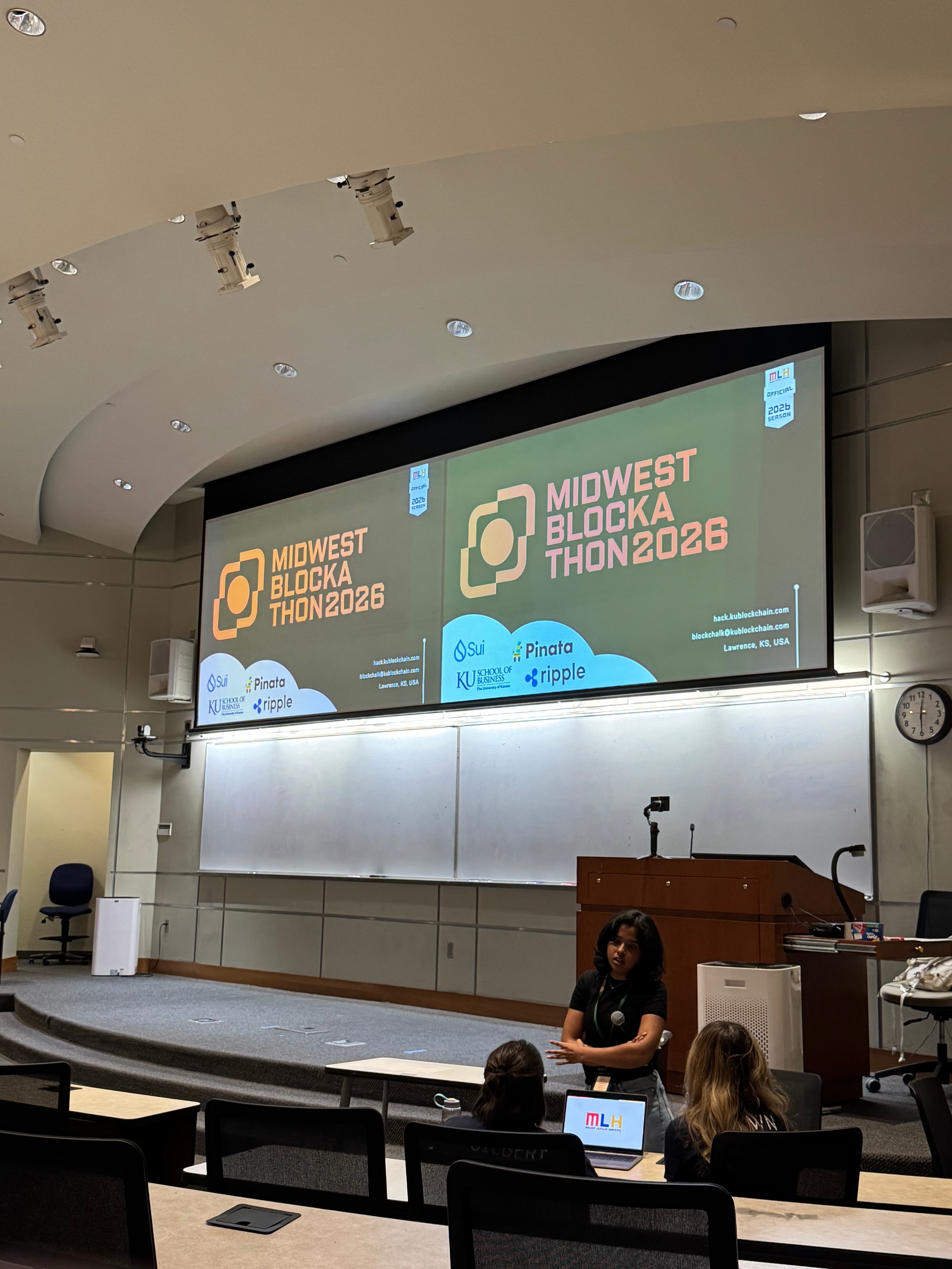 Midwest Blockathon sponsor screens displaying Pinata and XRPL logos